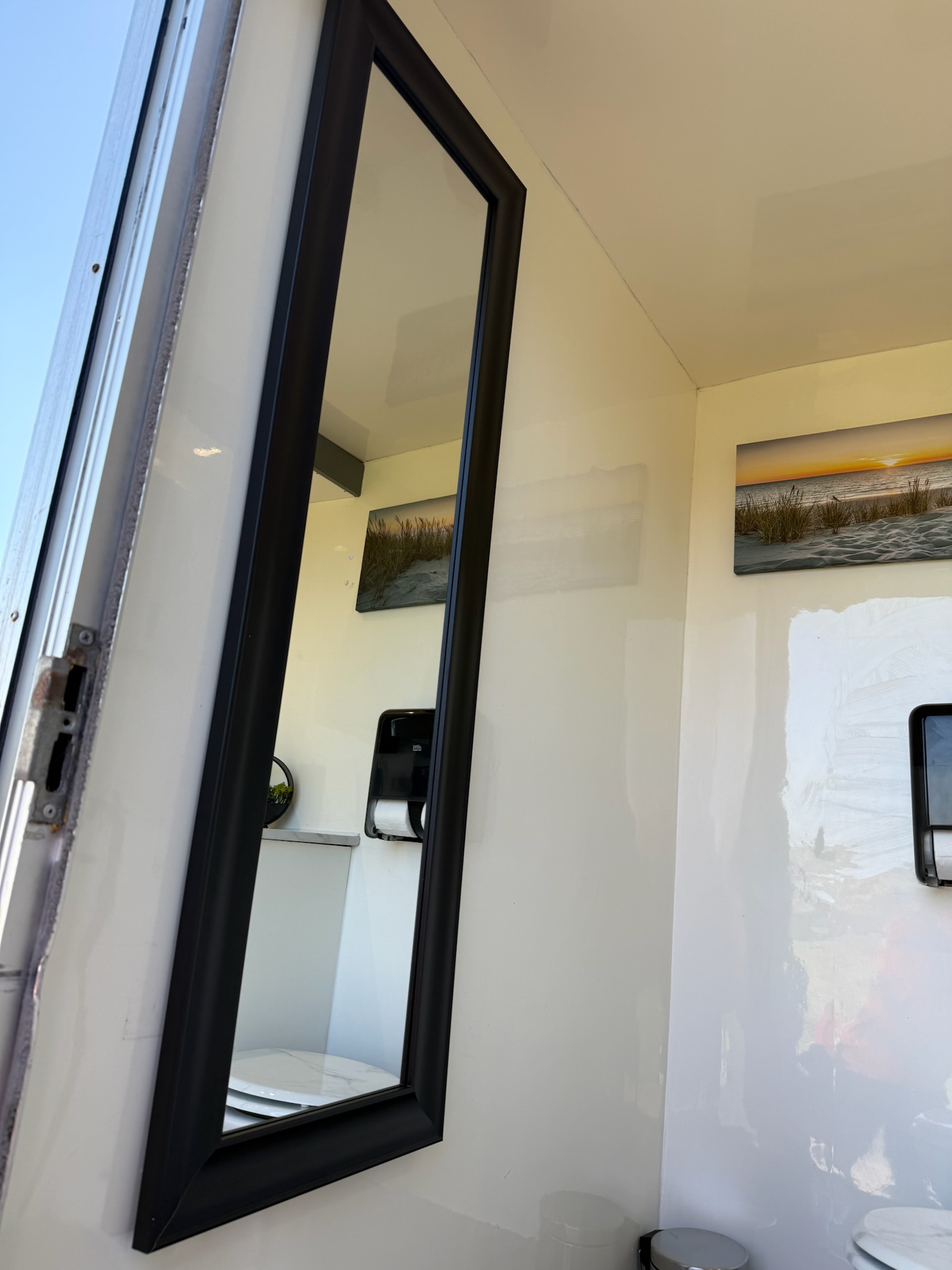 Luxury toilet trailer interior - full-length mirror and modern layout