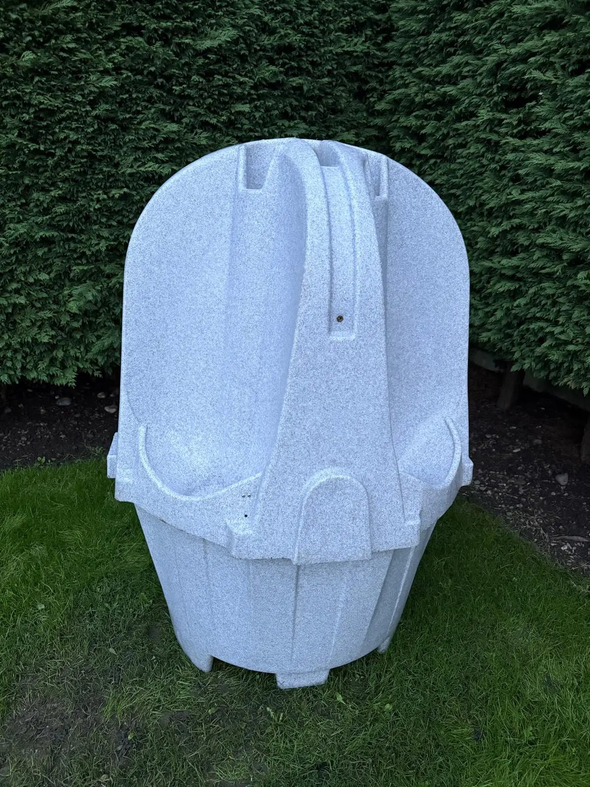 Front-facing view of a grey portable urinal unit with multiple urinals (alternative angle)