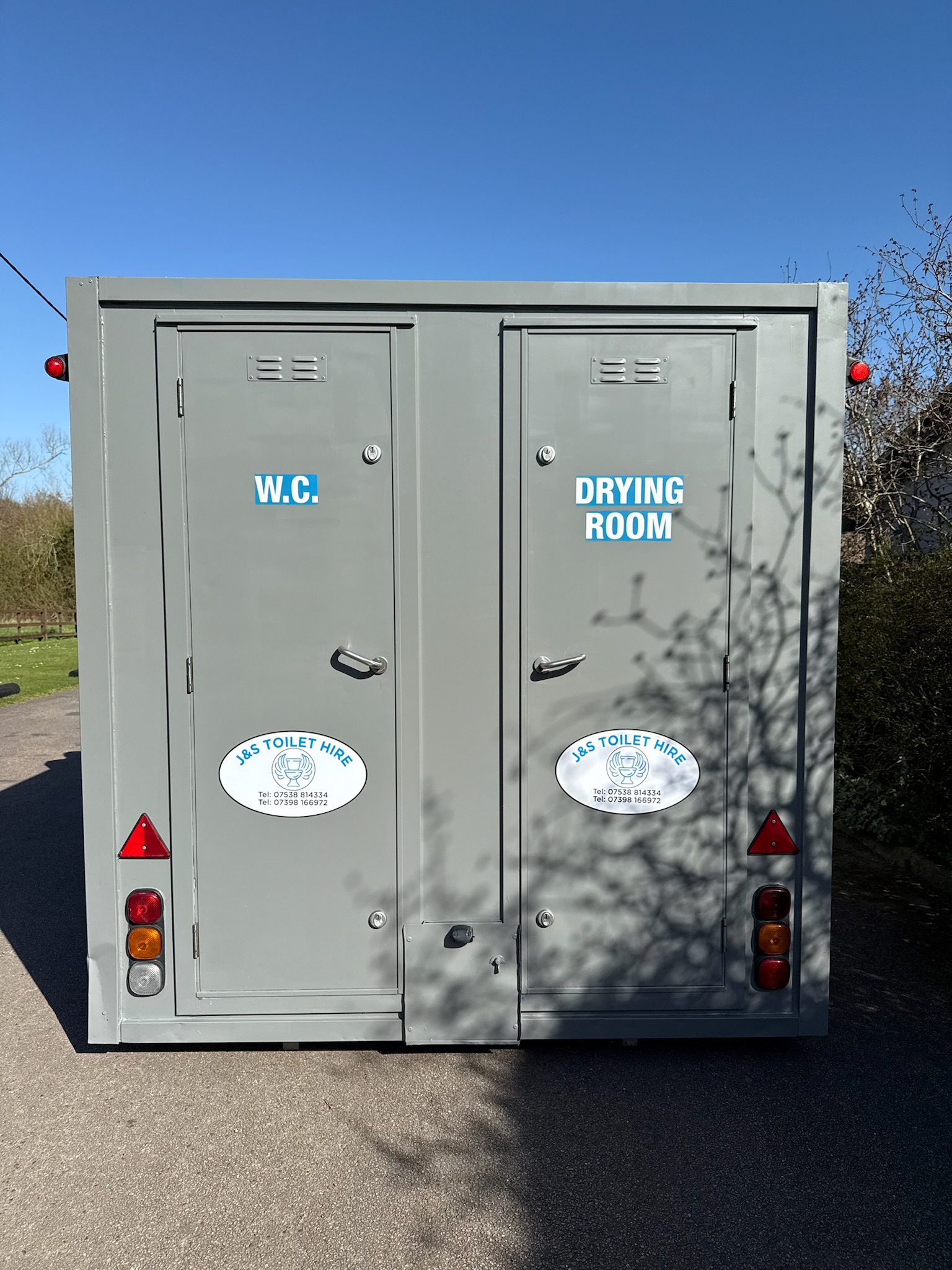 Welfare unit exterior - rear view with W.C. and Drying Room labels